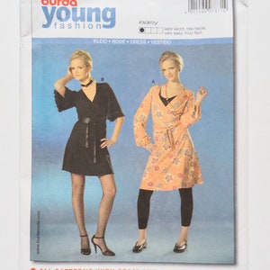 May include: A Burda Young Fashion sewing pattern packet, featuring two dress designs. The packet includes sizes 6-20 and European sizes 32-46. The cover displays illustrations of the dress styles.