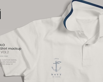 Może przedstawiać: Biała koszulka polo z niebieskim wykończeniem kołnierzyka. Koszulka ma logo kotwicy z napisem "NAVY" nadrukowanym poniżej.