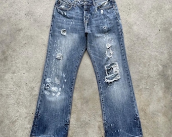 Spodnie jeansowe vintage Abercrombie&Fitch z rozcięciem na plecach i spranym wykończeniem BOOTCUT, szerokość 32x30,5