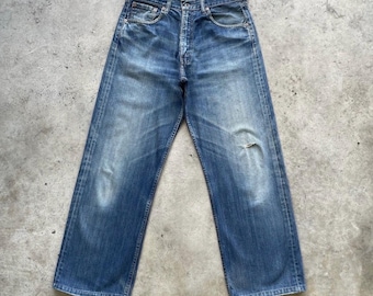 Spodnie jeansowe vintage Levi’s 504 Faded BAGGY Stonewashed w rozmiarze 31x29