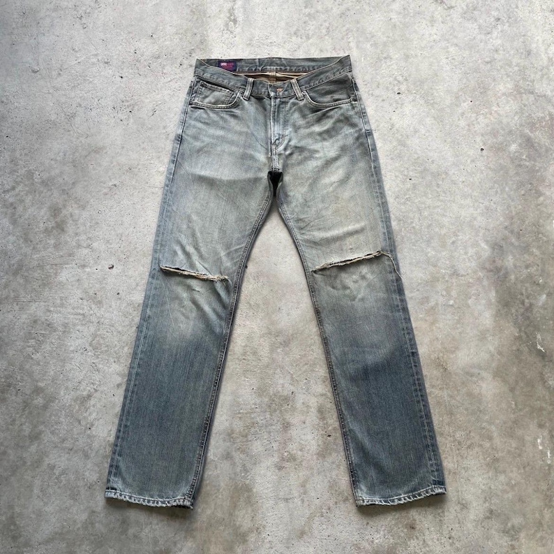 Pantalones vaqueros vintage Edwin 503 rasgados, fabricados en Japón, de mezclilla desteñida y desgastada, talla W34x34. imagen 1