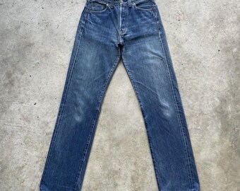 Spodnie jeansowe Vintage Levi's Big E USA Faded Buckle Selvedge z rozporkiem na guziki, szerokość 28x33,5
