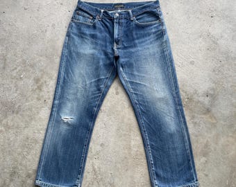 Spodnie jeansowe vintage japońskiej marki z efektem sprania (szer. 35x27)