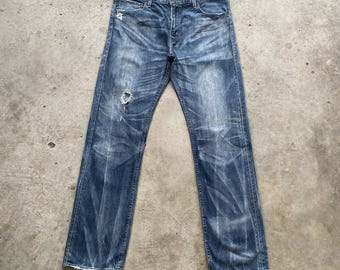 Vintage Levi’s 202 Faded Buckle Denim Distressed Jeans Pants (W36x32.5)