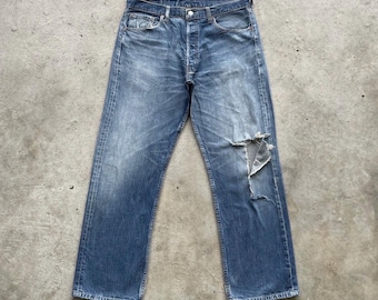 Spodnie jeansowe Vintage Levi’s 501 Ripped Button Fly Faded Distressed (W35x30)