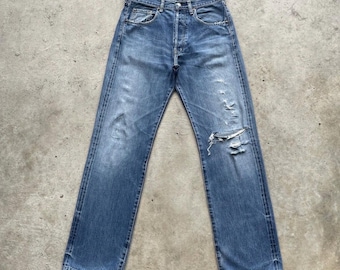 Spodnie jeansowe vintage Levis 503 Big E z przetarciami i rozporkiem na guziki, w rozmiarze 32x33,5