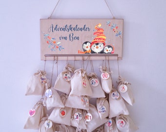 Adventskalender mit Anhängern und Baumwollsäckchen