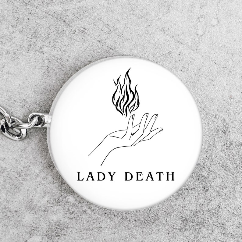 lady death on a keychain