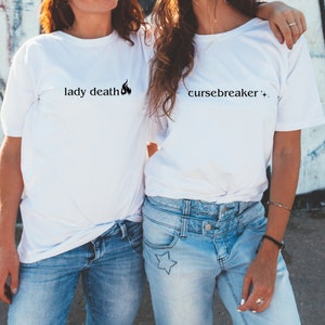 matching lady death and cursebreaker t-shirts