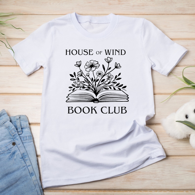 House of Wind book club on a white t shirt