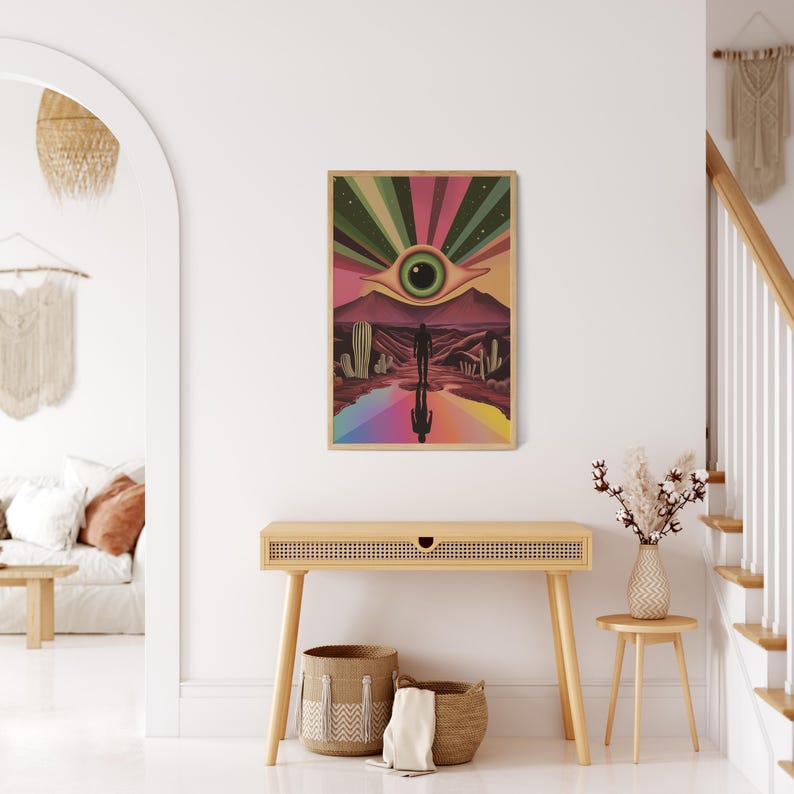 May include: A psychedelic poster featuring a large eye at its centre, surrounded by a rainbow of colours. The eye gazes out over a desert landscape with a solitary figure walking towards it.