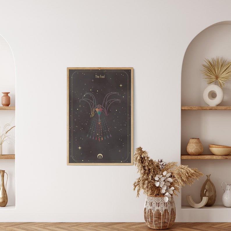 May include: A black and gold tarot card with the title "The Fool" and a colorful illustration of a figure with outstretched arms against a starry background.