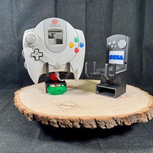 Dreamcast controller wall mount. Illuminated (Original corded controller) Retro gaming organization.