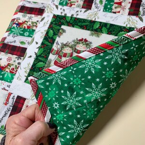 Snowman Charm Quilted Table Topper NCU0DDK1250