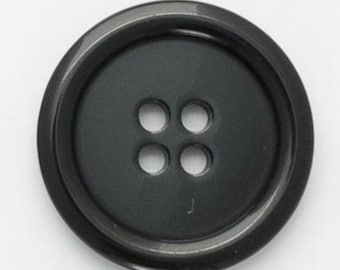 May include: A black plastic button with four holes.
