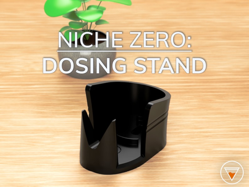 May include: Black plastic coffee dosing stand with a curved design. The stand is on a wooden surface. Niche Zero: Dosing Stand.