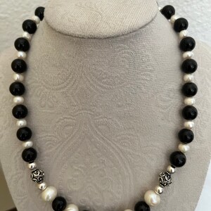 Free form freshwater pearls, black jasper and sterling silver necklace.