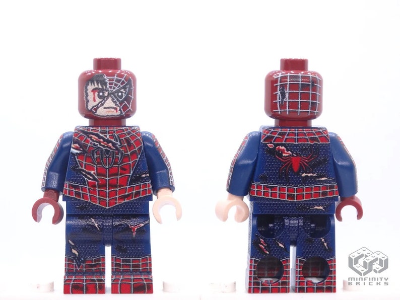 May include: A Lego minifigure of Spider-Man in a battle-damaged costume. The figure features a red and blue suit with a spiderweb design, and a partially unmasked face. The figure has a red head and arms, and a blue torso and legs.
