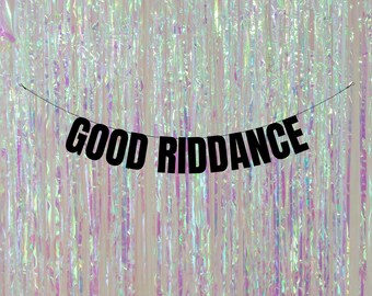 May include: A black banner with the text "GOOD RIDDANCE" hanging in front of a shimmering iridescent curtain.