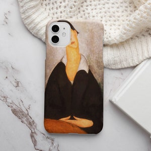 May include: A phone case featuring a painting of a woman with a dark blue dress and a white collar. The woman has a light complexion and her hair is dark. The background is a light brown color.
