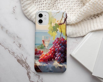 May include: A phone case with a painting of a glass of white wine and grapes on a table. The background is a blue sky and water.