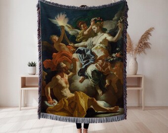 Puede incluir: Manta tejida con una pintura clásica que representa figuras con túnicas y querubines. La obra de arte utiliza colores vibrantes, incluyendo rojos, azules y dorados. La manta tiene un borde con flecos y se exhibe en interiores.