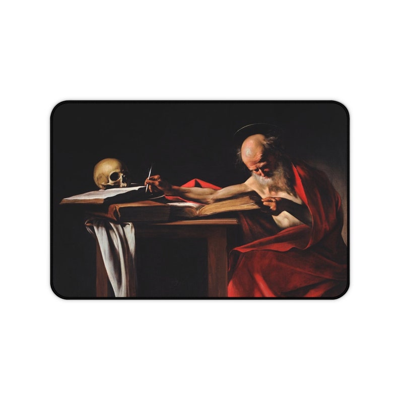 May include: A painting of a man in a red robe writing in a book. A skull is on the table next to him.