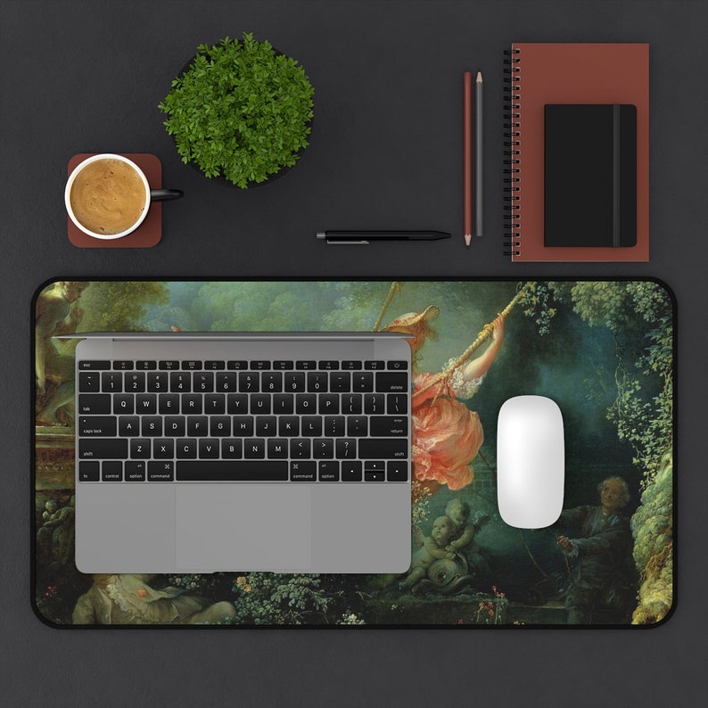 May include: A mousepad featuring a vintage painting of a woman on a swing in a lush garden setting. The painting is in a muted color palette of greens, browns, and blues.