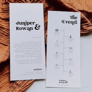 Pode incluir: Dois cartões de convite de casamento brancos com texto preto, com os nomes "Juniper Rowan" e detalhes do evento. Os cartões estão em um fundo de tecido texturizado de cor ferrugem.