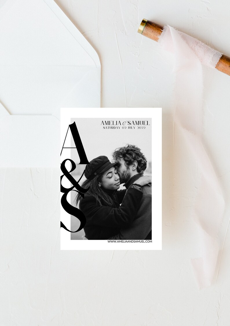 May include: A black and white wedding invitation with the text "Amelia & Samuel" and "Saturday 02 July 2022". The invitation features a black and white photo of a couple embracing.