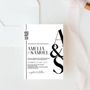 May include: Black and white wedding invitation with the date "02 07 22" and the names "Amelia & Samuel" printed on a white background. The text reads "Joyfully request the your presence as they celebrate their marriage on Saturday 02 July 2022 at six o'clock in the evening Core Cider House 35 Merrivale Road, Pickering Brook Western Australia reception to follow."