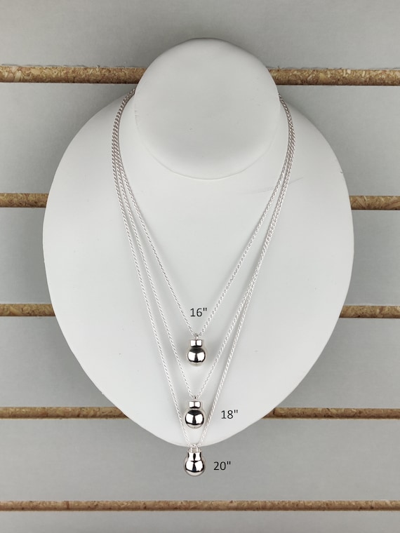 Gold nitroglycerin best sale necklace