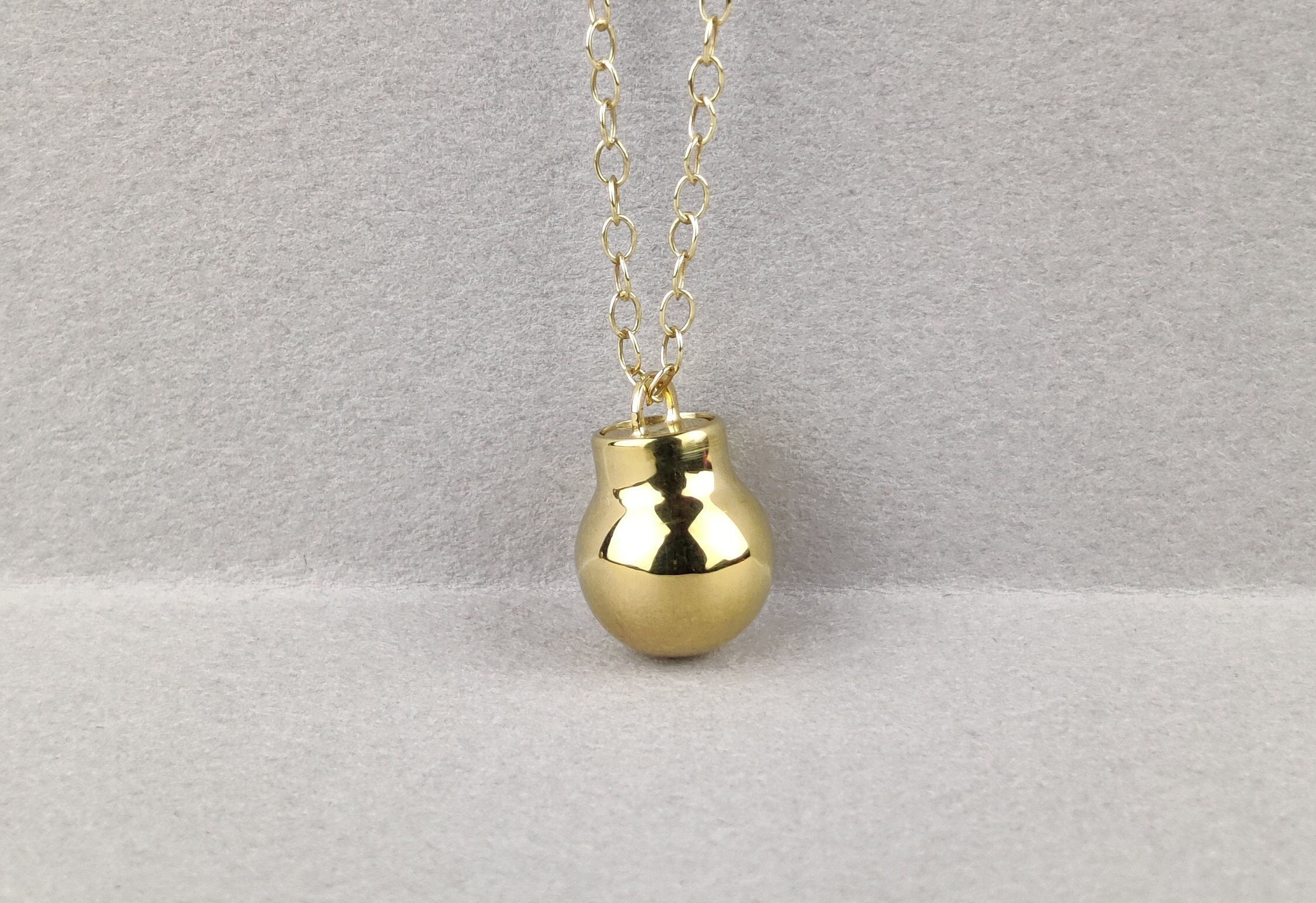 Gold nitroglycerin best sale necklace
