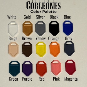 May include: A color palette chart with the words "Corleones Color Palette" at the top. The chart shows 15 different colors, including white, gold, silver, black, blue, beige, brown, yellow, orange, grey, green, purple, red, pink, and magenta.