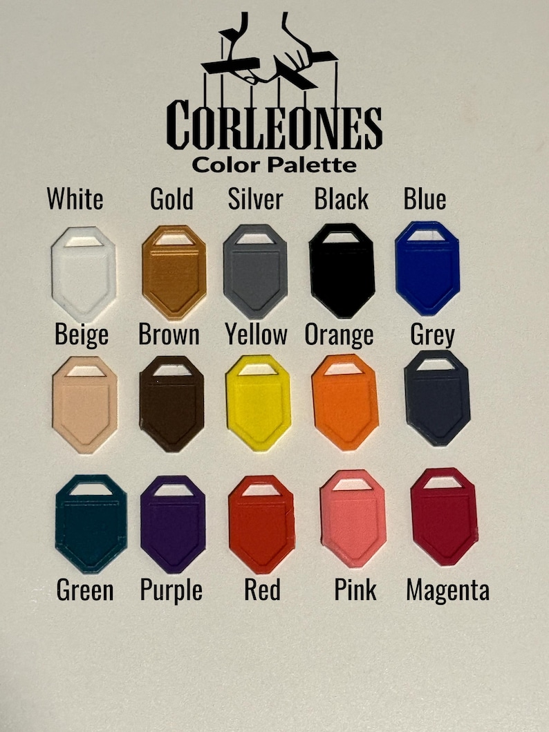 May include: A color palette chart with the words "Corleones Color Palette" at the top. The chart shows 15 different colors, including white, gold, silver, black, blue, beige, brown, yellow, orange, grey, green, purple, red, pink, and magenta.