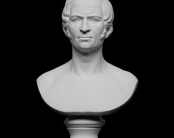May include: A white bust of a man with short, styled hair and a serious expression. The sculpture is mounted on a pedestal, set against a black background. The bust is a classical art piece.