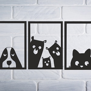 Pode incluir: Três molduras de metal preto com silhuetas de animais recortadas. A moldura da esquerda mostra um cão com os olhos fechados. A moldura do meio mostra três gatos com os olhos fechados. A moldura da direita mostra um gato com os olhos abertos.