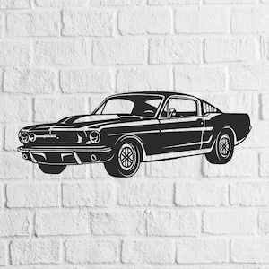 May include: Black and white illustration of a classic muscle car, a vintage coupe, mounted on a white brick wall. The car features a detailed front grille, headlights, and wheels, showcasing a timeless design.