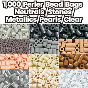 May include: An assortment of Perler bead bags in various colors, including neutrals, stones, metallics, pearls, and clear. The image displays a variety of bead colors, such as gray, brown, beige, and metallic silver. The text at the top reads "1,000 Perler Bead Bags".