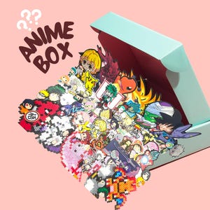 May include: An open, light blue box overflowing with colorful anime character stickers and pins. The box has a red interior and sits on a pink background. Text on the box reads "ANIME BOX" with question marks.