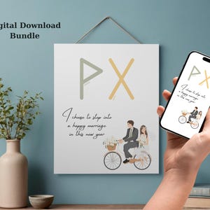 Puede incluir: Un paquete de descarga digital con una impresión blanca con las letras PX en gris y dorado, y el texto "Elegí entrar en un matrimonio feliz en este nuevo año". Un teléfono inteligente muestra el mismo diseño.
