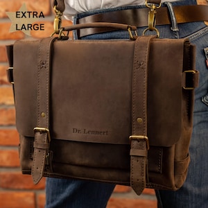 A close-up image of a brown leather satchel with the name "Dr. Lennert" printed on it.