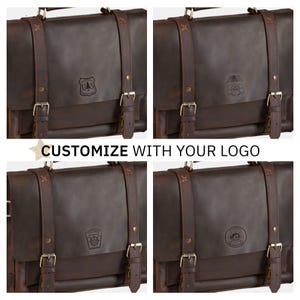 a collection of brown leather briefcases or messenger bags, each with a unique logo or emblem printed on the front. The bags have leather straps and buckles, giving them a classic and sophisticated appearance. The image also includes text that reads "CUSTOMIZE WITH YOUR LOGO", suggesting that the bags can be personalized with a company's logo or branding.
