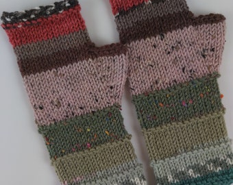 May include: A pair of colorful striped knitted fingerless gloves with a teal blue trim. The gloves are made with a speckled yarn and have a variety of colors including red, brown, pink, green, and gray.