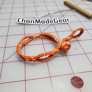 Pulsera para hombre y mujer con nudo de botón y cadena de margaritas y grillete suave