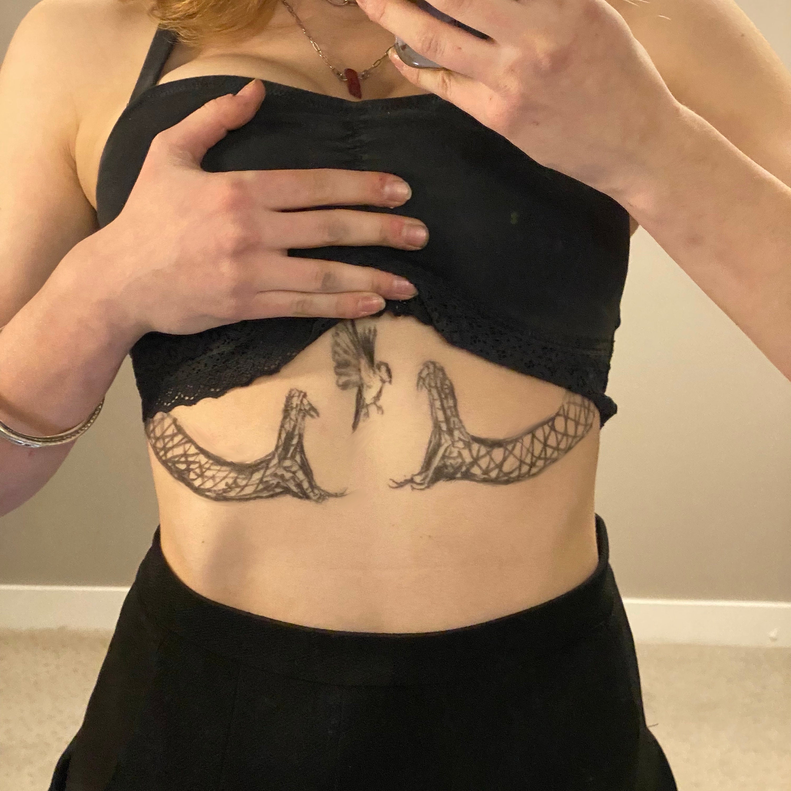 Snake Tattoo on Girls Sternum