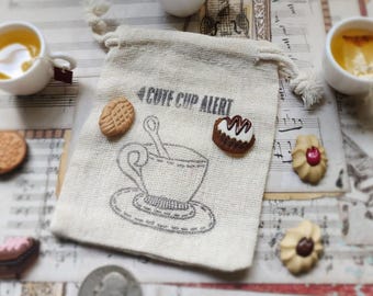 Imanes para amantes del té: Juego de taza de té y galletas