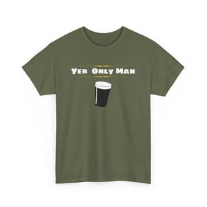 May include: A green t-shirt with the text "Yer Only Man" and a graphic of a pint glass of beer.