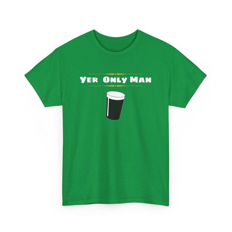 May include: Green t-shirt with the text "Yer Only Man" and a graphic of a pint glass of beer.