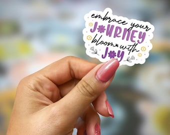 Omarm je reis sticker: Inspirerende vinyl sticker met bloemenmotief